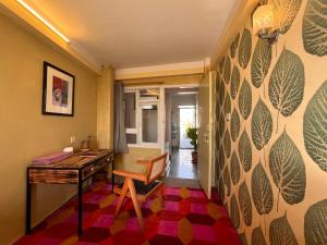 a room with a desk and a hallway at Front Stupa View in Kathmandu +34 photos