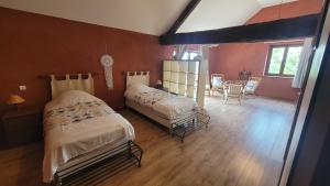 Ένα ή περισσότερα κρεβάτια σε δωμάτιο στο La Parenthèse