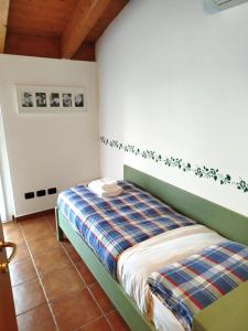 Ένα ή περισσότερα κρεβάτια σε δωμάτιο στο The Fairy World - Penthouse with Terrace Lake view and Pool