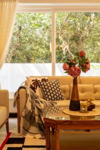 Χώρος καθιστικού στο Auraya Homes - Luxury 4 BHK, Private Pool, Terrace, Live Barbeque