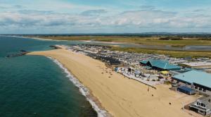 an aerial view of a beach and the ocean at Cosy Retreat in Selsey