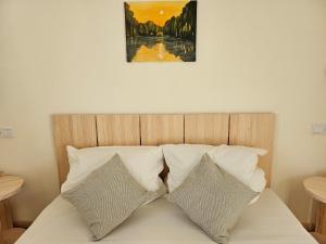 Ένα ή περισσότερα κρεβάτια σε δωμάτιο στο Naturhaus Havelland