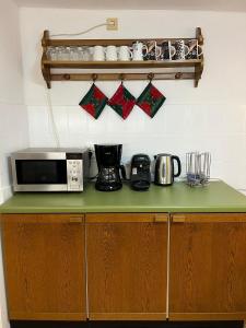 Kuchyň nebo kuchyňský kout v ubytování Boxenstop Ossendorf