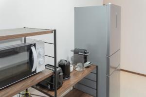 Køkken eller tekøkken på 똘이하우스 모모다니