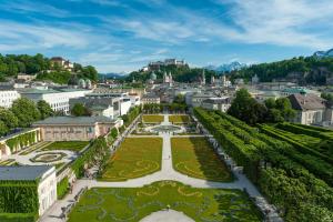 an aerial view of a city with a park at DAD Vogelweiderhof Rooms in Salzburg