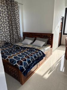 Postel nebo postele na pokoji v ubytování sukoon natural farm