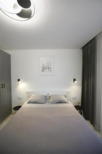 Giường trong phòng chung tại Gargždai, Lithuania