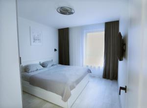 Giường trong phòng chung tại Gargždai, Lithuania