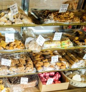 a bakery filled with lots of different types of pastries at Komfortowa kawalerka w dobrym miejscu in Świnoujście