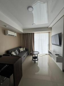 Et tv og/eller underholdning på Maikhao Beach Condominium