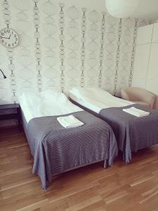 Кровать или кровати в номере Ikaplace