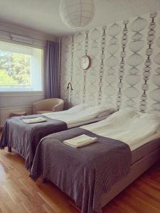 Кровать или кровати в номере Ikaplace