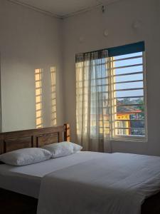 Postel nebo postele na pokoji v ubytování Ocean breeze