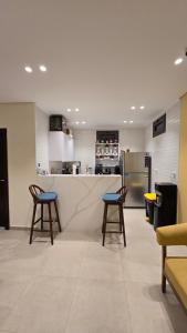 Kuchyň nebo kuchyňský kout v ubytování Villa Swenet