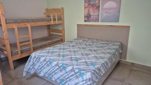 Postel nebo postele na pokoji v ubytování Suites Aconchegantes - Casa da Villa Bertioga