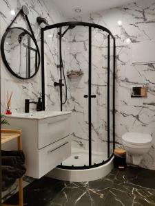 Ένα μπάνιο στο Apartamenty Królówka