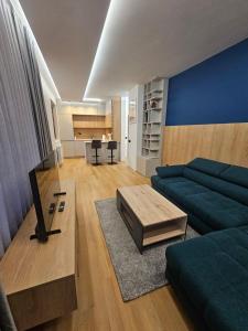 Et opholdsområde på Luxury Forest Apartment