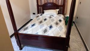 En eller flere senge i et værelse på Pentagon Hotel