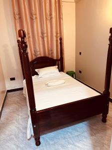 En eller flere senge i et værelse på Pentagon Hotel