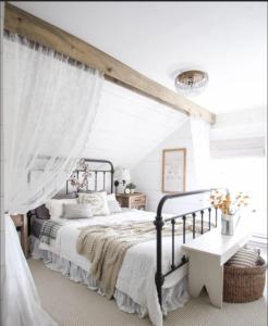 a bedroom with a bed with a canopy at DIMORA MAJELLA in Chieti