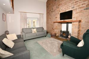 Et opholdsområde på Poppythorn Cottage at Lovelady Shield