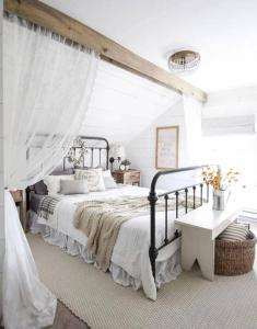 a white bedroom with a bed with a canopy at DIMORA MAJELLA in Chieti +45 photos