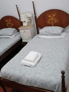 Ένα ή περισσότερα κρεβάτια σε δωμάτιο στο Douro Nature With Pool House