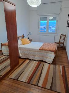 Ένα ή περισσότερα κρεβάτια σε δωμάτιο στο Torre Plaza 5