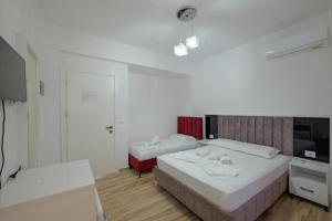 Postel nebo postele na pokoji v ubytování Villa Summer Borsh