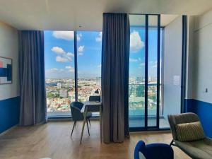 Un lugar para sentarse en The Quarter Ramkhamhaeng by UHG