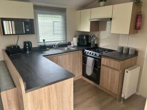 Køkken eller tekøkken på Limewood Lodge