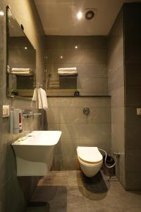 Koupelna v ubytování Hotel Kashmir inn + 11 fotografií