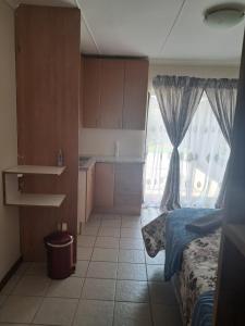 Et opholdsområde på Mukonazwothe Guesthouse