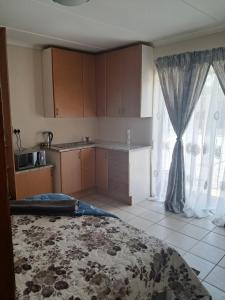 Køkken eller tekøkken på Mukonazwothe Guesthouse