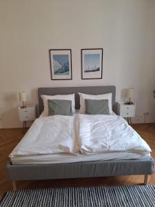 Una cama o camas en una habitación de Innsbruck Residence