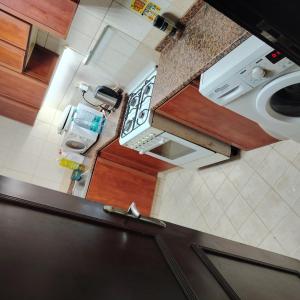 Kuchyň nebo kuchyňský kout v ubytování Private room Ajman downtown