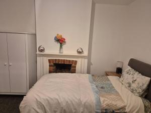 Ένα ή περισσότερα κρεβάτια σε δωμάτιο στο Private Room, closer to train station