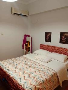 Postel nebo postele na pokoji v ubytování Savelona's Guest Appartment