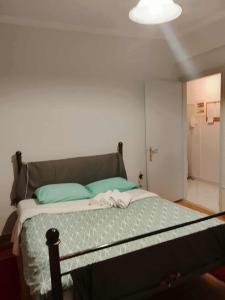 Postel nebo postele na pokoji v ubytování Savelona's Guest Appartment