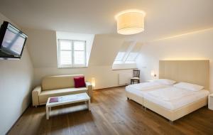 Postel nebo postele na pokoji v ubytování Apartment Nestroygasse
