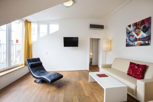 TV a/nebo společenská místnost v ubytování Apartment Nestroygasse