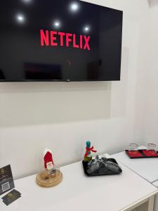 Μια τηλεόραση ή/και κέντρο ψυχαγωγίας στο B&B Central Station +39 φωτογραφίες