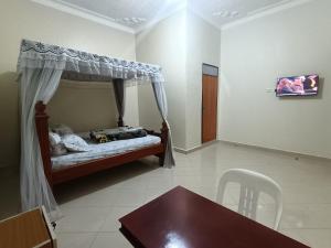 TV a/nebo společenská místnost v ubytování NSHEVI SAFARI HOTEl