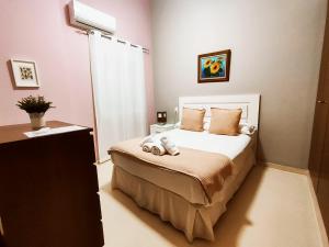 En eller flere senge i et værelse på Adosado kintsuji