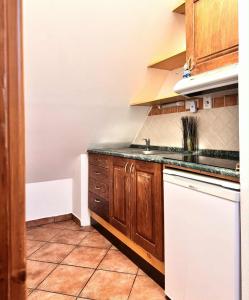 Kuchyň nebo kuchyňský kout v ubytování Sport hotel POMI + 30 fotografií