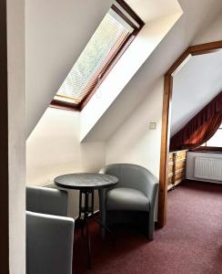 Posezení v ubytování Sport hotel POMI