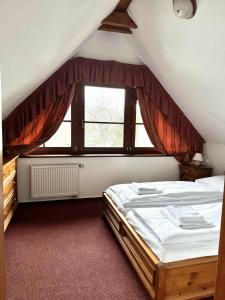 Postel nebo postele na pokoji v ubytování Sport hotel POMI