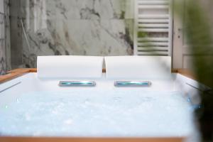 two empty boxes sitting on top of a table at Villa La Torre in San Giuliano Terme