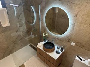 Et badeværelse på Refugio da Ponta do Sol 2 - Madeira Inn Group