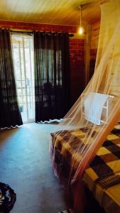 Ένα ή περισσότερα κρεβάτια σε δωμάτιο στο Talblick Valley